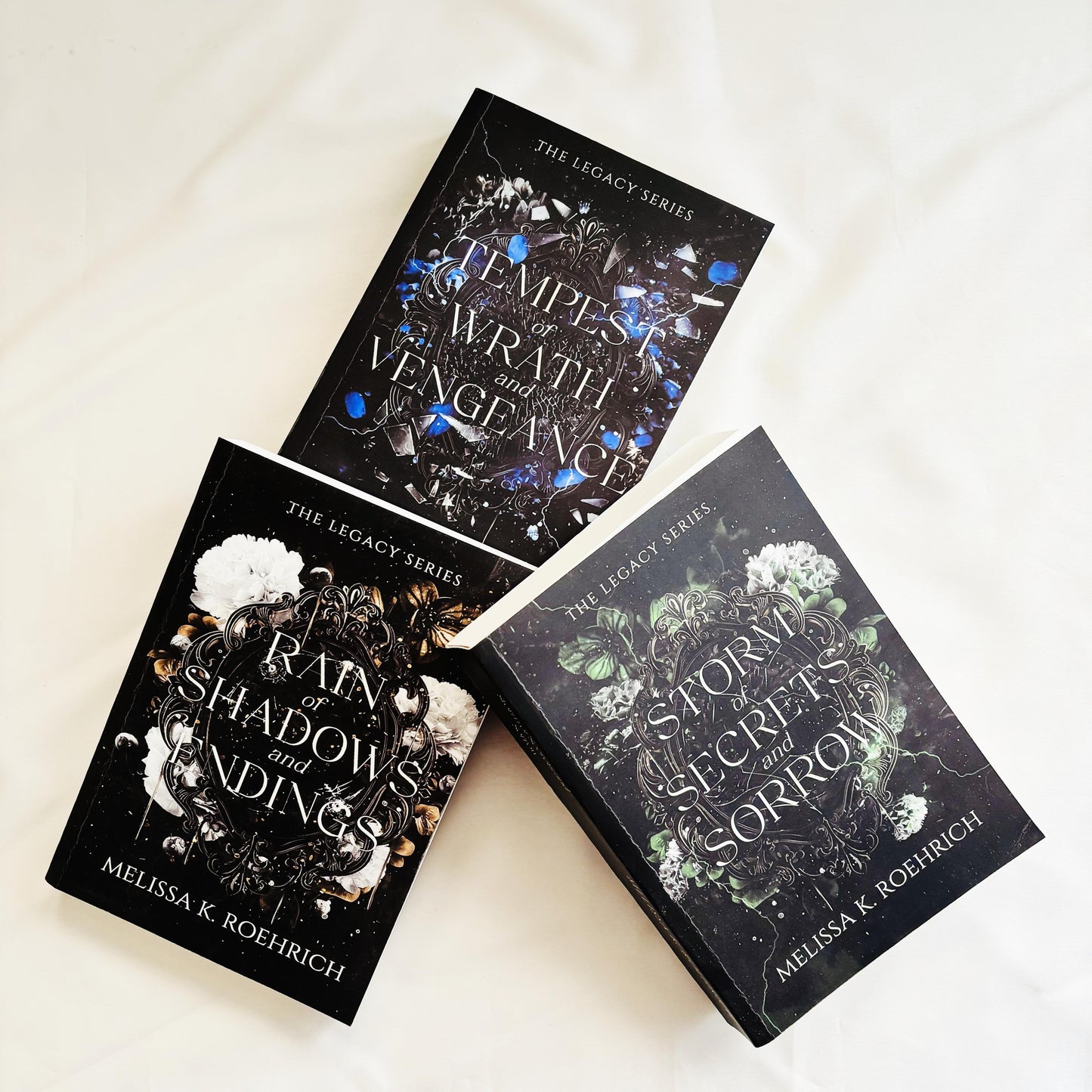 Legacy Series (Rain of Shadows and Endings + Storm of Secrets and Sorrow + Tempest of Wrath and Vengeance) by Melissa K. Roehrich
